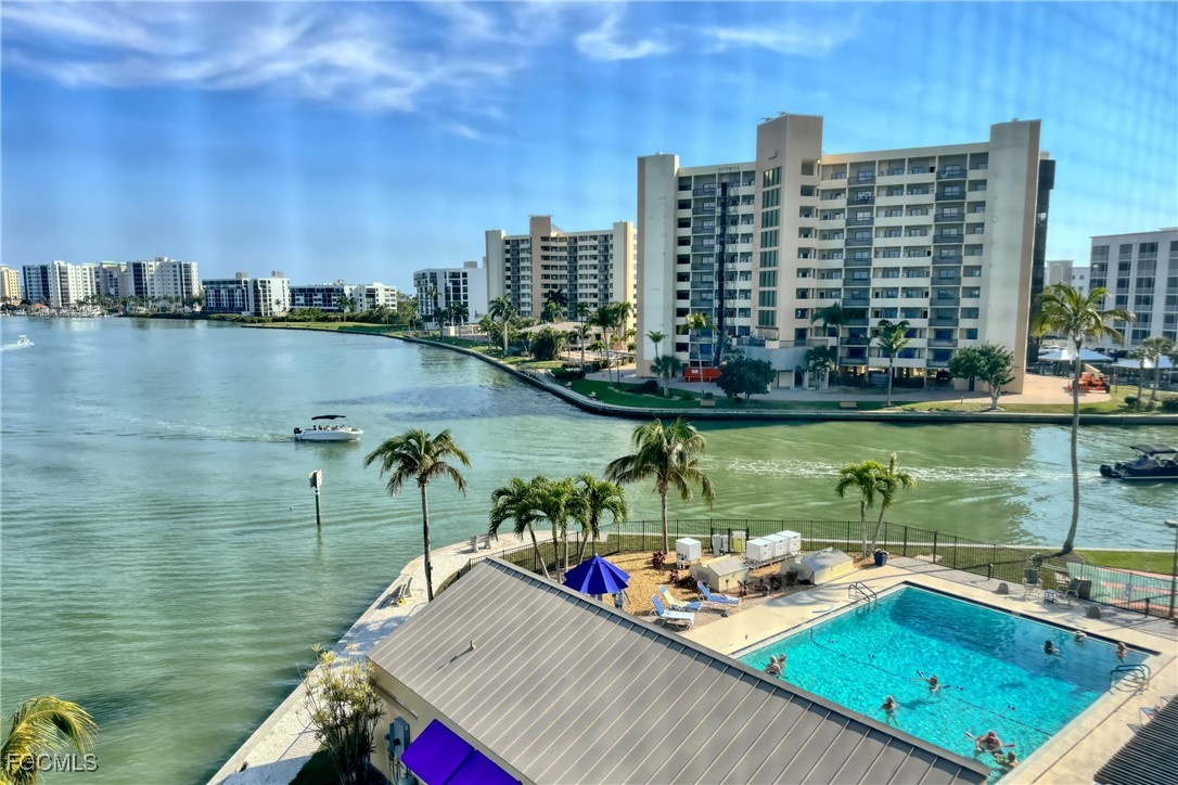 400 Lenell Road, Unit 408 Fort Myers Beach, FL 33931 - Photo 33 of 34 a view of a lake with tall buildings