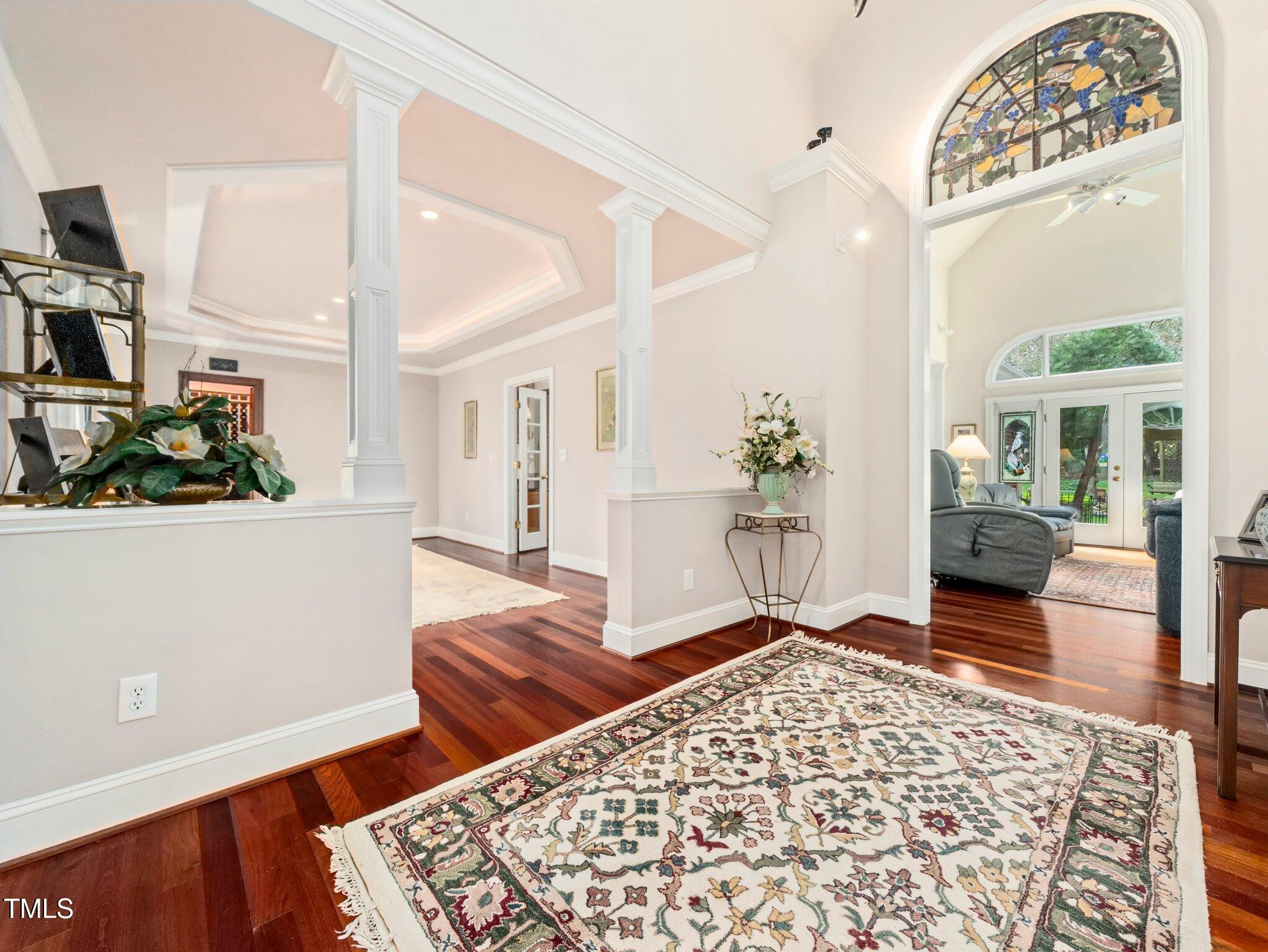 10937 Cahill Road Raleigh, NC 27614 - Photo 10 of 53 a living room with furniture and a rug
