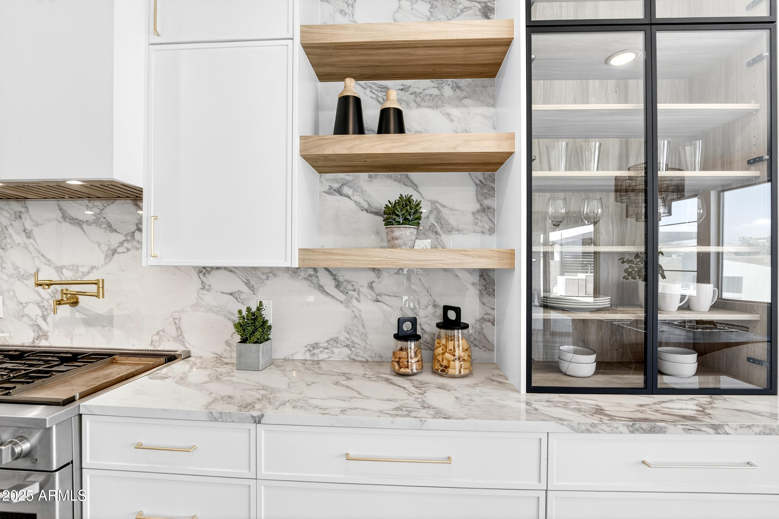 4247 South Element Mesa, AZ 85212 - Photo 26 of 120 a kitchen with a stove and cabinets