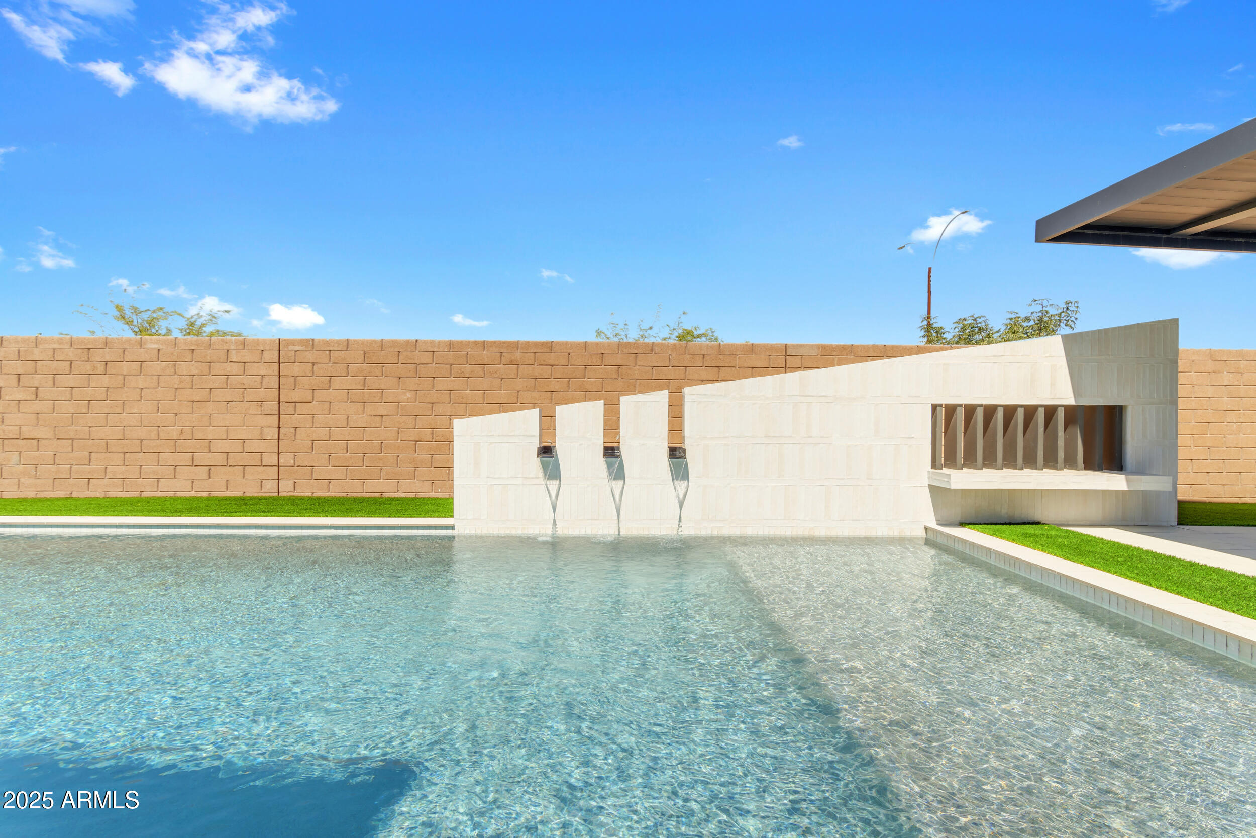 4247 South Element Mesa, AZ 85212 - Photo 95 of 120 a view of a room with a swimming pool and outdoor seating