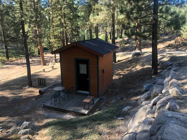 a bathroom with a sink mirror and vanity