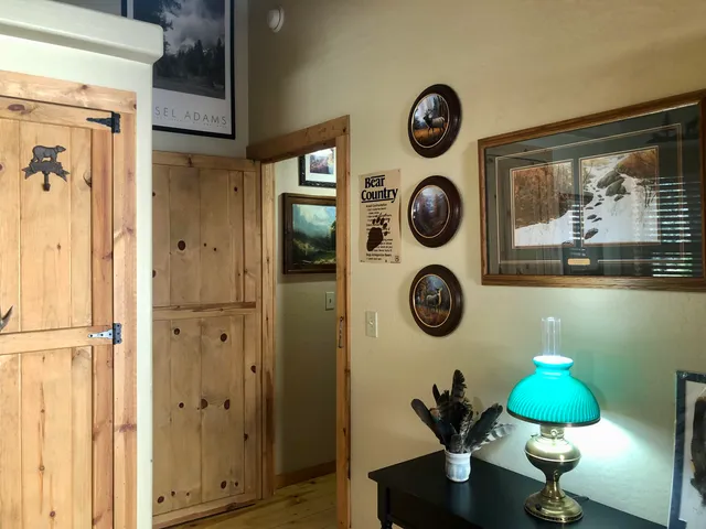 a table with a clock and a lamp