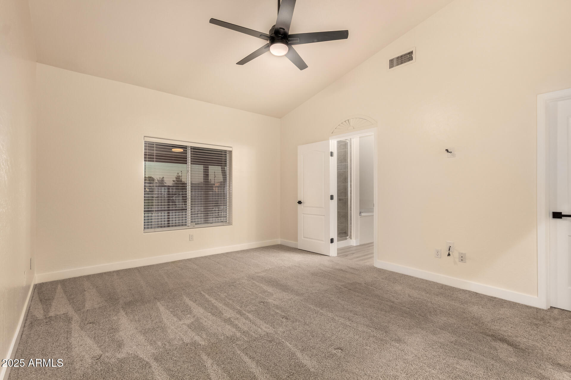 4273 South 165th Way Gilbert, AZ 85297 - Photo 20 of 56 an empty room with windows and fan
