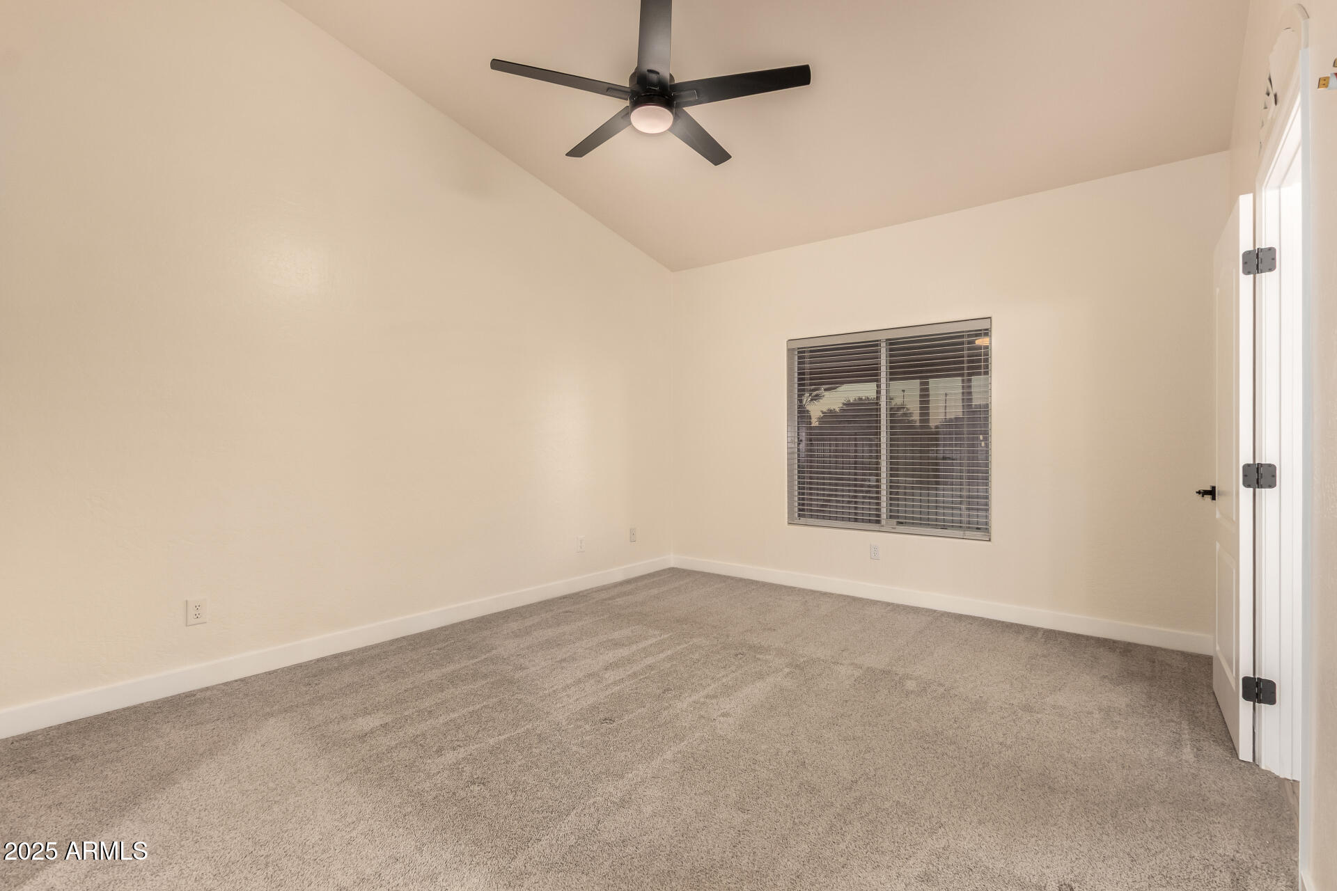 4273 South 165th Way Gilbert, AZ 85297 - Photo 22 of 56 an empty room with windows and fan