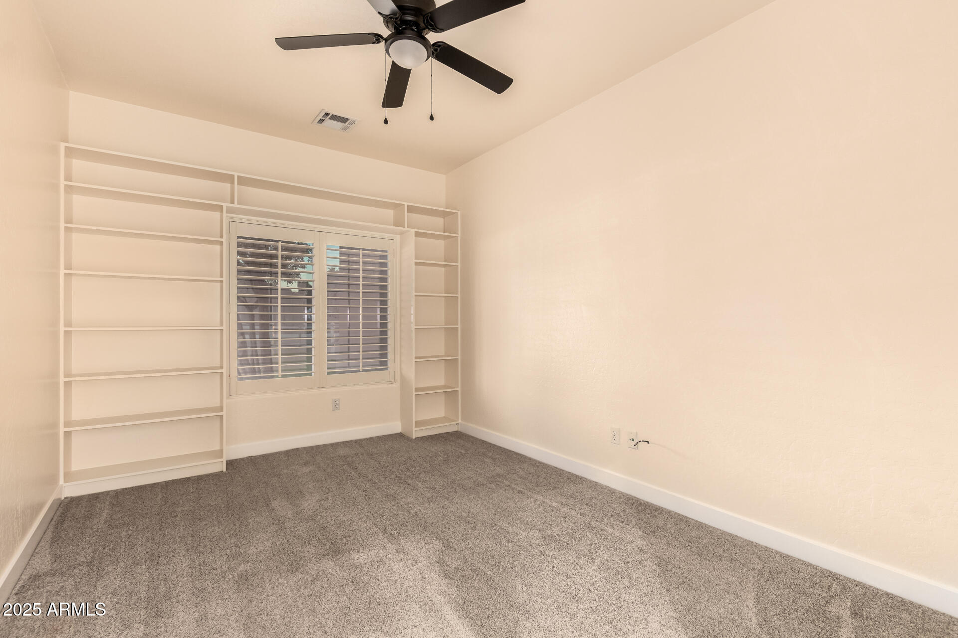 4273 South 165th Way Gilbert, AZ 85297 - Photo 27 of 56 an empty room with a empty space and windows