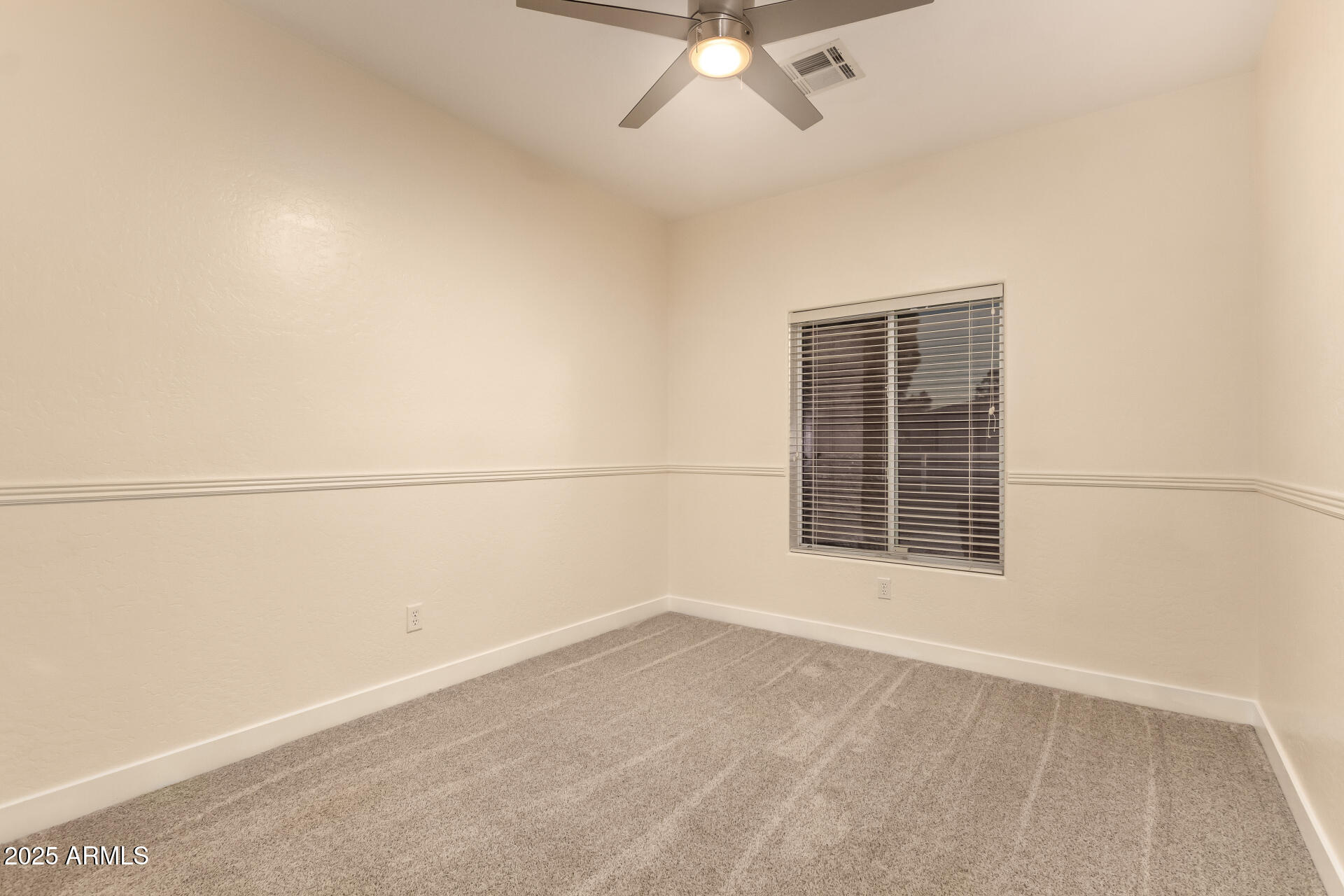 4273 South 165th Way Gilbert, AZ 85297 - Photo 31 of 56 an empty room with a window