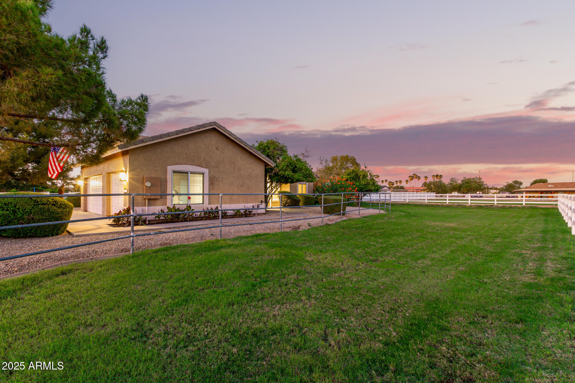 4273 South 165th Way Gilbert, AZ 85297 - Photo 47 of 56 a view of house with backyard outdoor seating and hardwood