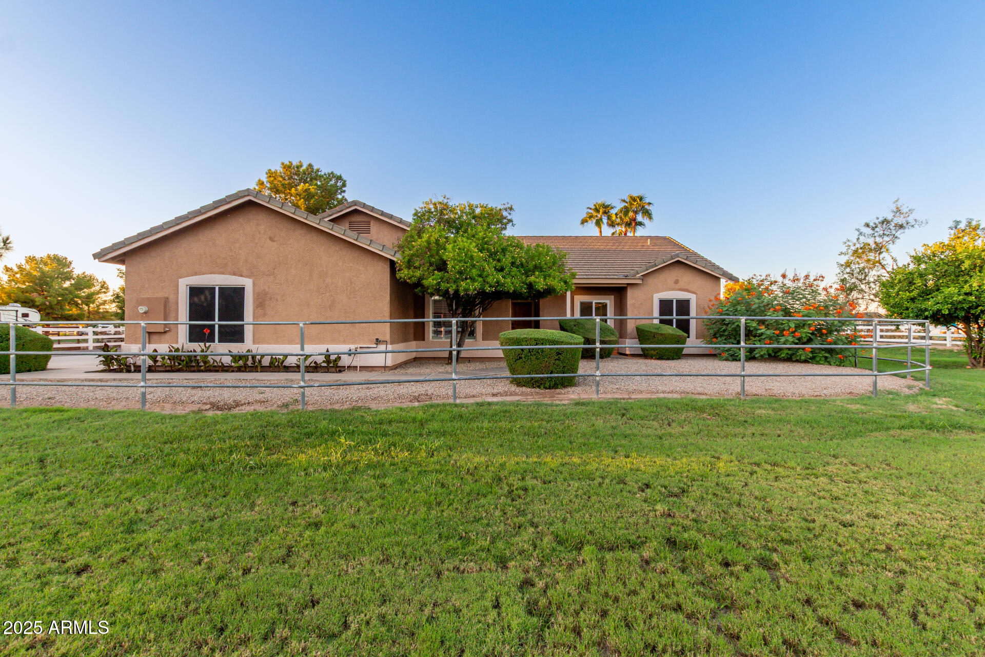 4273 South 165th Way Gilbert, AZ 85297 - Photo 55 of 56 a front view of a house with a yard