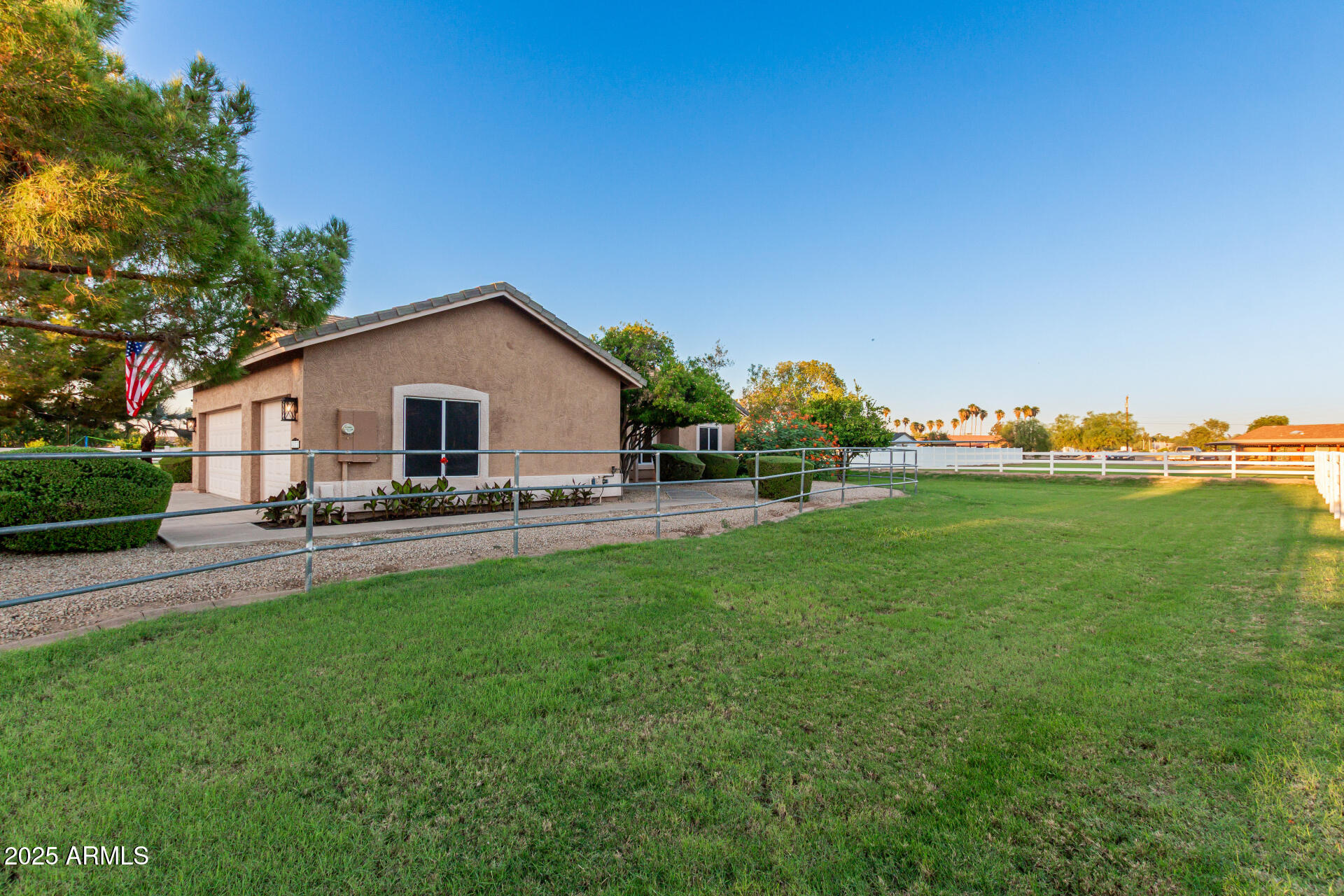 4273 South 165th Way Gilbert, AZ 85297 - Photo 56 of 56 a front view of house with yard and outdoor seating