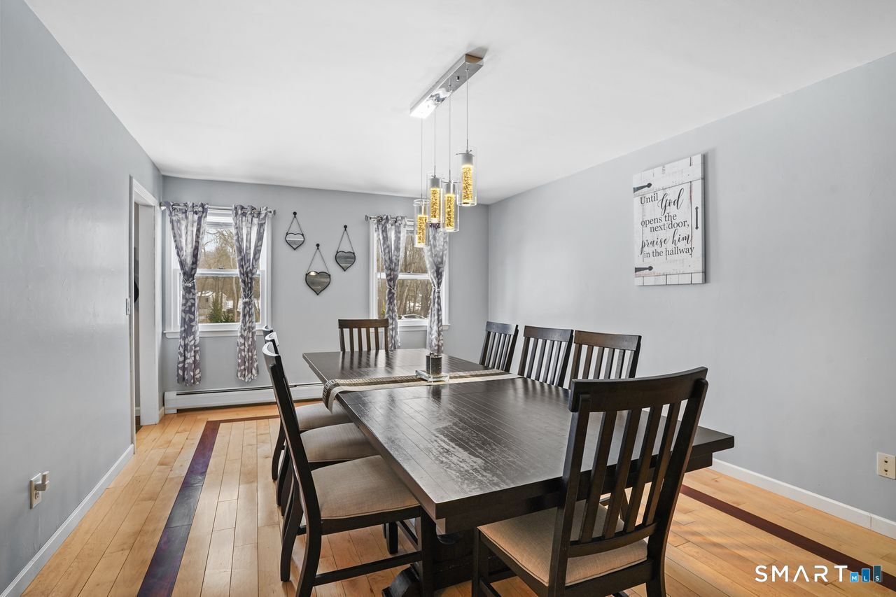 17 Moose Hill Road Trumbull, CT 06611 - Photo 16 of 40 a view of a dining room with furniture window and wooden floor