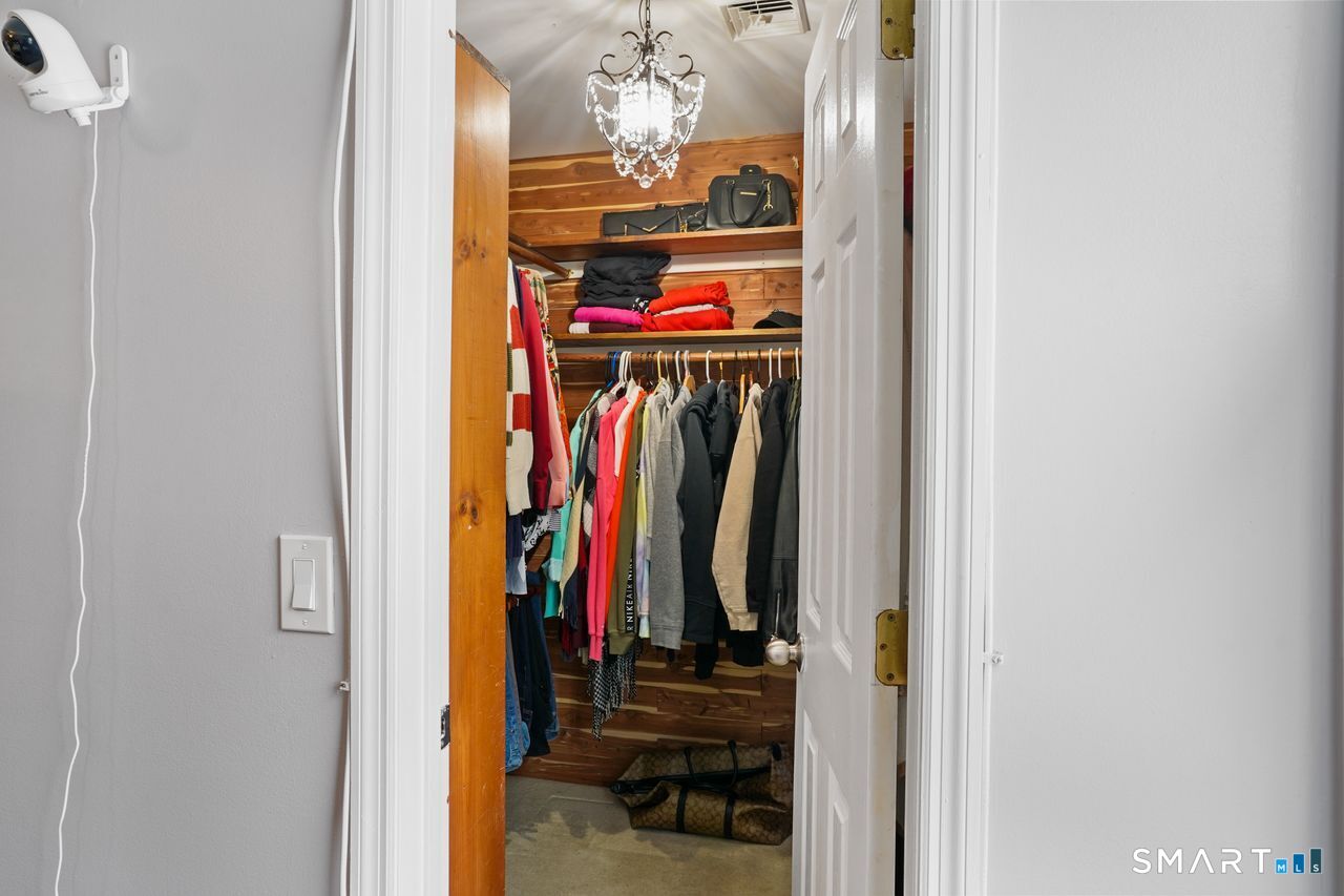 17 Moose Hill Road Trumbull, CT 06611 - Photo 23 of 40 a view of a closet with storage