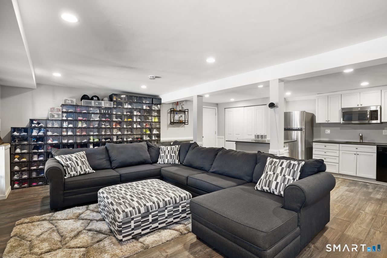 17 Moose Hill Road Trumbull, CT 06611 - Photo 33 of 40 a living room with furniture and a couch