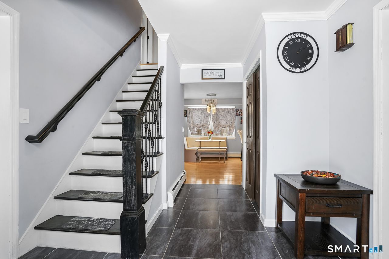 17 Moose Hill Road Trumbull, CT 06611 - Photo 5 of 40 a view of entryway and hall with wooden floor