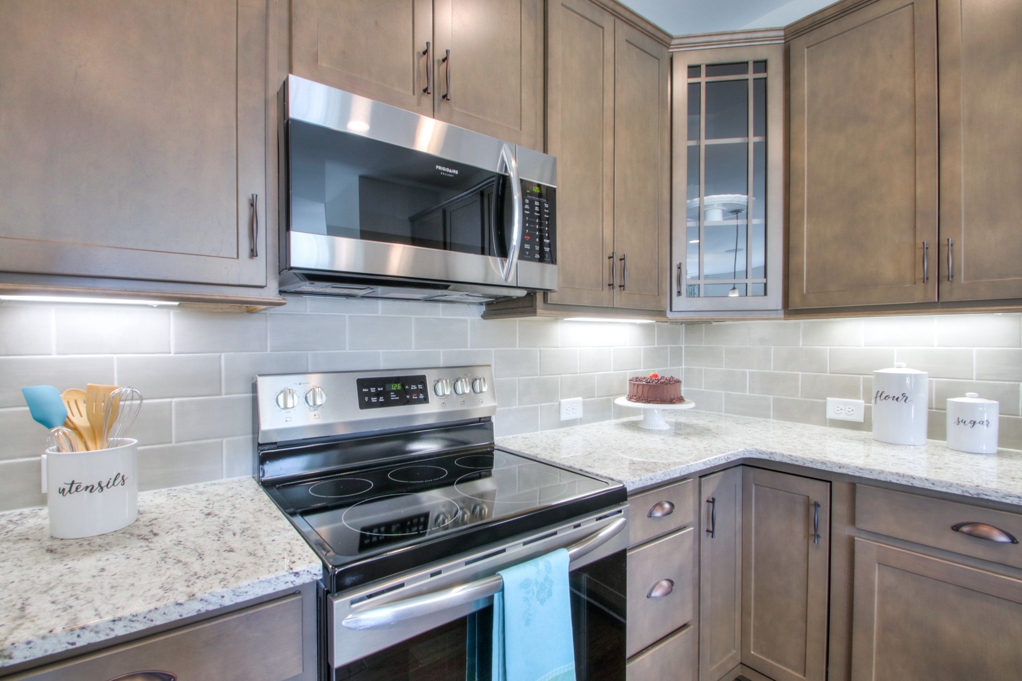 223 Cloverbrook Way Gallatin, TN 37066 - Photo 16 of 51 a kitchen with stainless steel appliances granite countertop a sink and a stove top oven