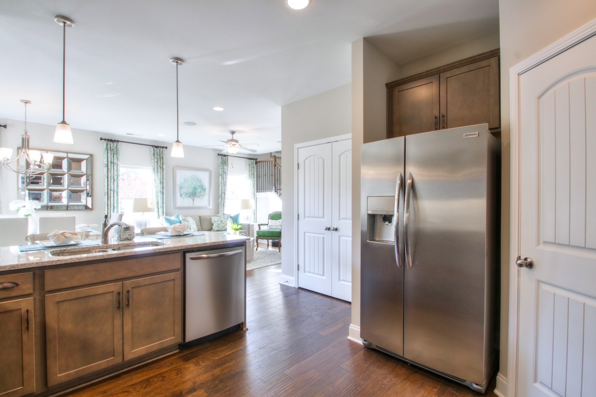 223 Cloverbrook Way Gallatin, TN 37066 - Photo 17 of 51 a kitchen with stainless steel appliances granite countertop a refrigerator a sink a stove and a wooden floors