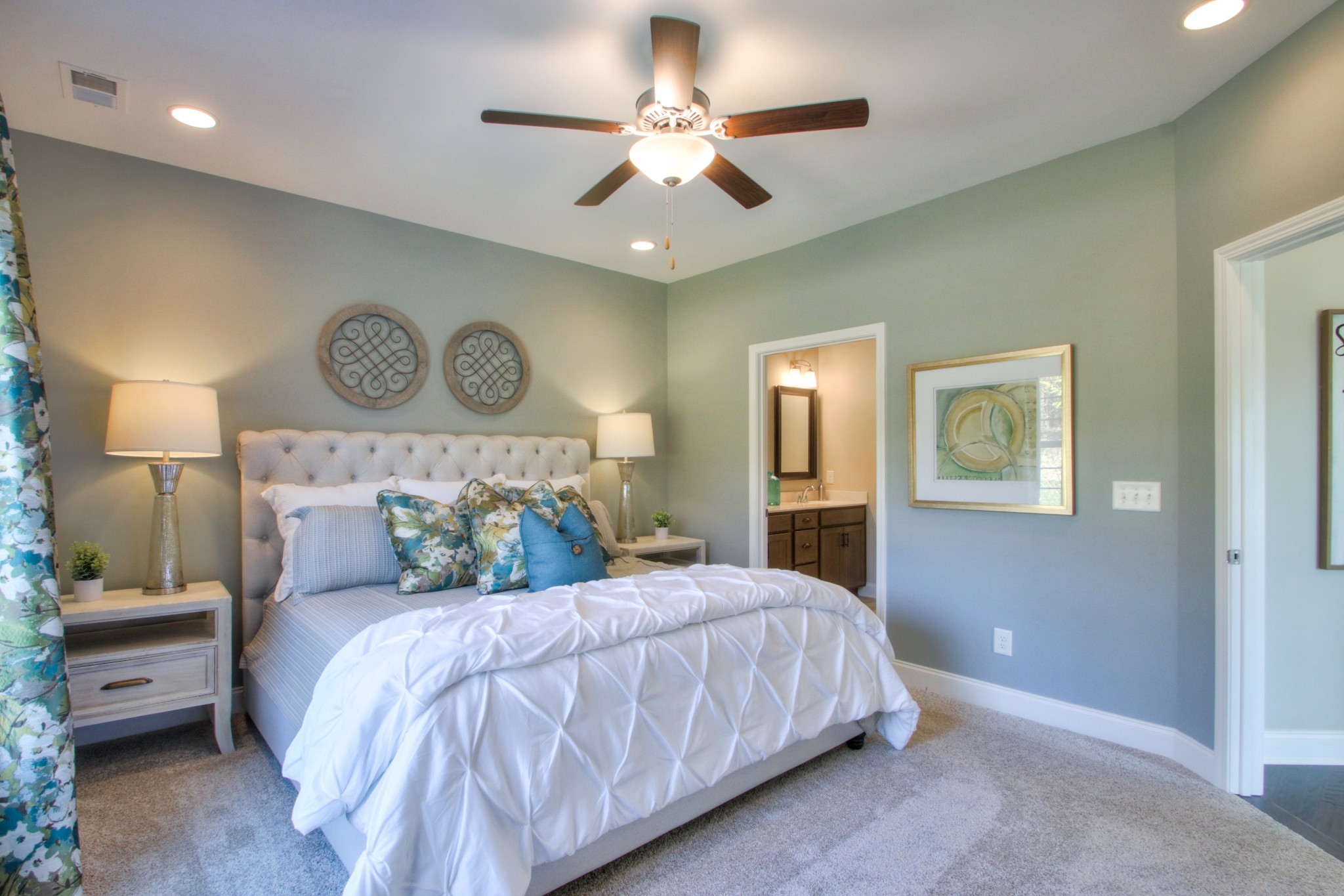 223 Cloverbrook Way Gallatin, TN 37066 - Photo 24 of 51 a bedroom with a bed and a chandelier