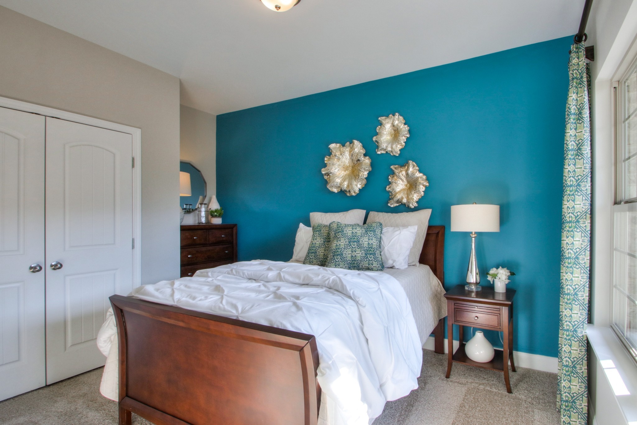 223 Cloverbrook Way Gallatin, TN 37066 - Photo 29 of 51 a bed room with a bed and a painting on the wall