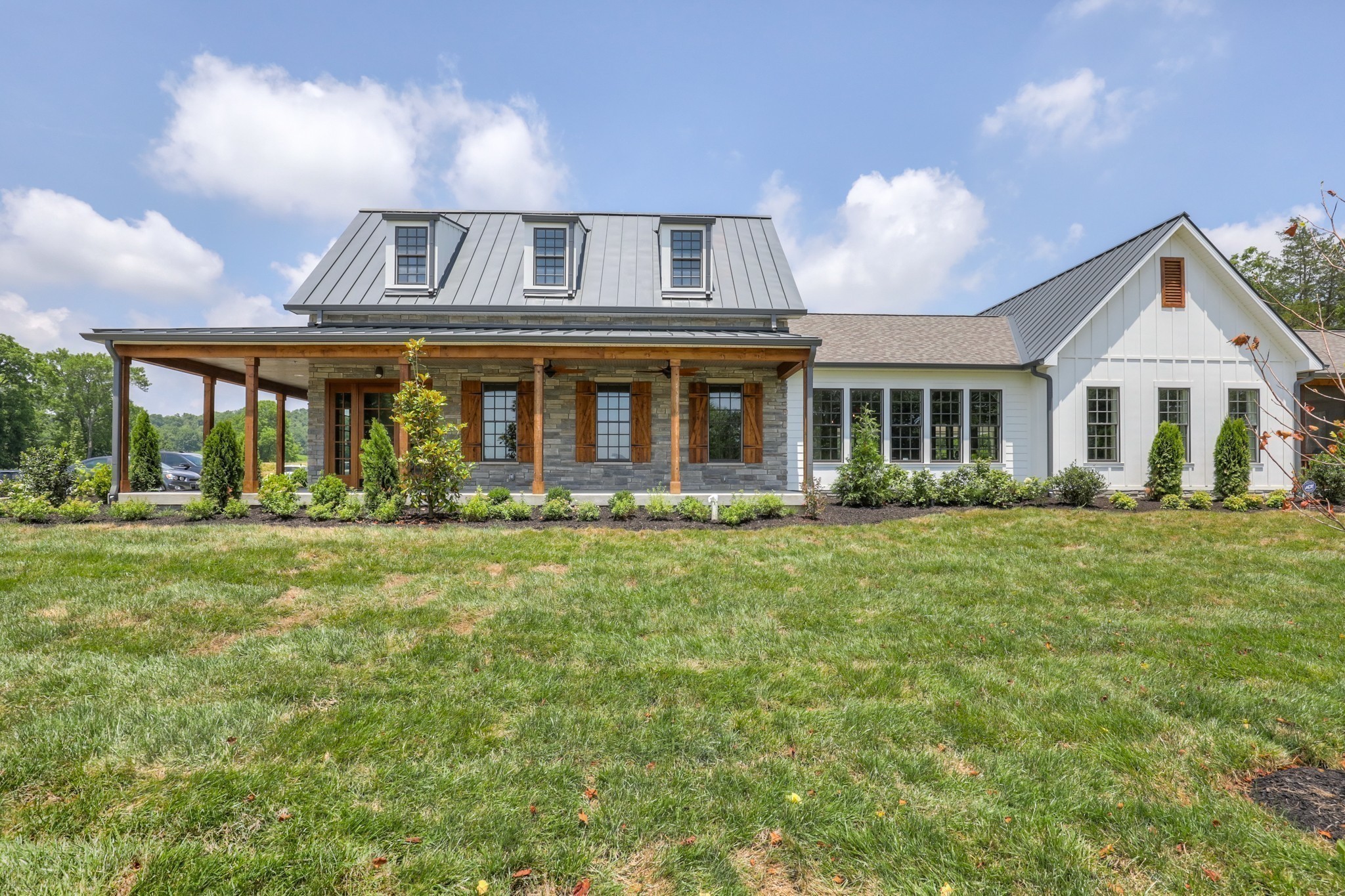 223 Cloverbrook Way Gallatin, TN 37066 - Photo 34 of 51 a front view of a house with a garden
