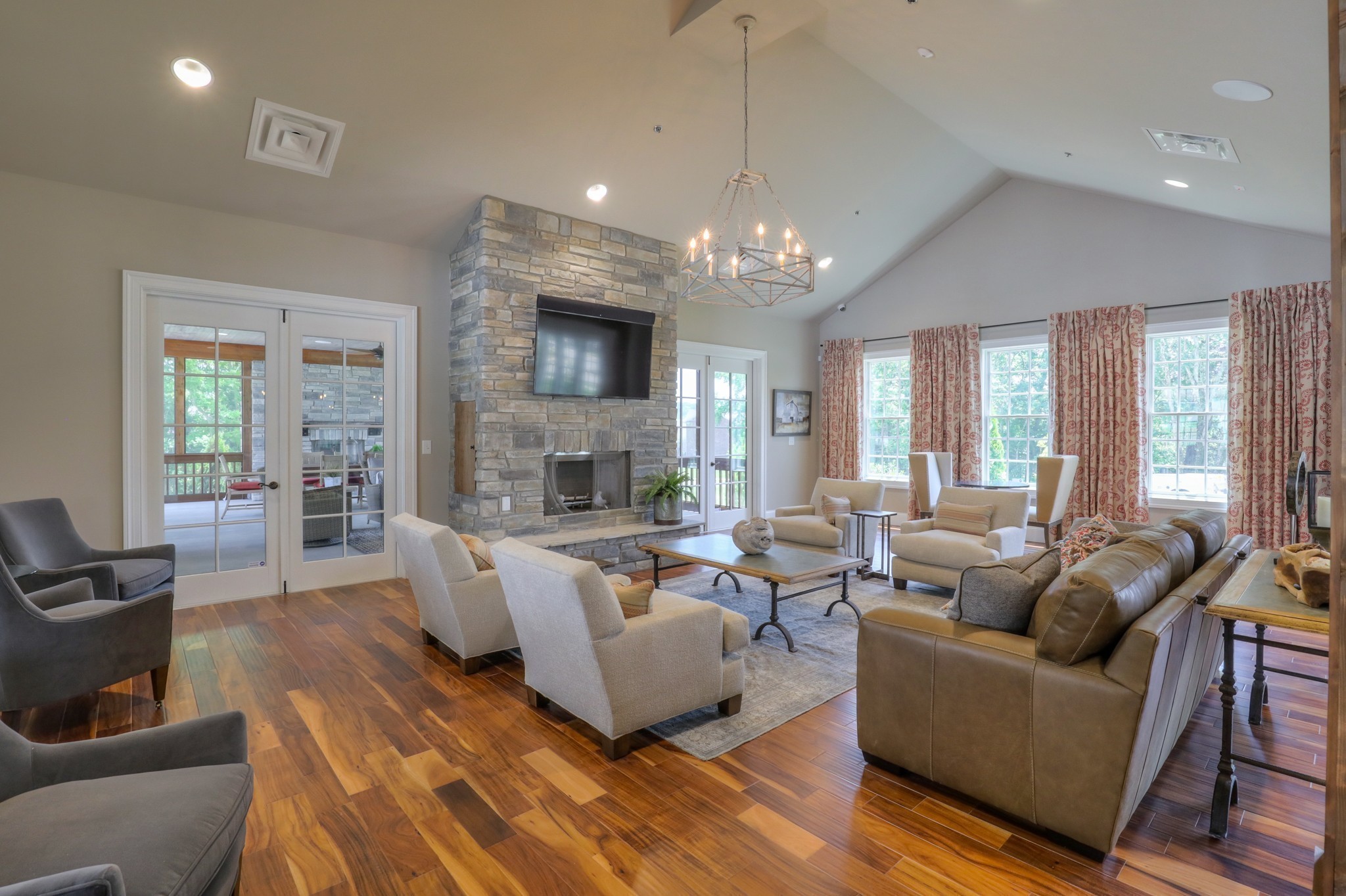 223 Cloverbrook Way Gallatin, TN 37066 - Photo 38 of 51 a living room with furniture a fireplace and a chandelier