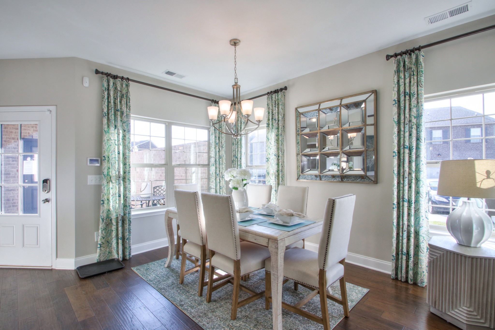223 Cloverbrook Way Gallatin, TN 37066 - Photo 9 of 51 a dining room with furniture a chandelier and wooden floor