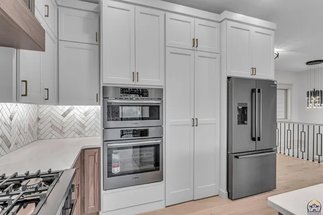 $450,000 | 3400 Southeast Howard Drive, Topeka, KS 66605