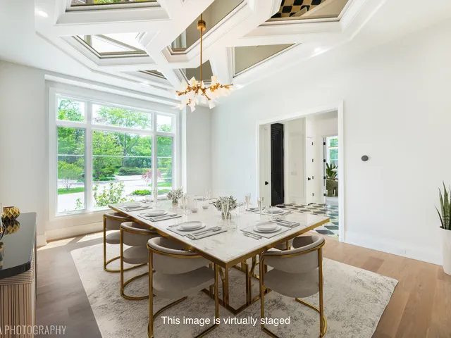 a kitchen with stainless steel appliances granite countertop a sink and a stove