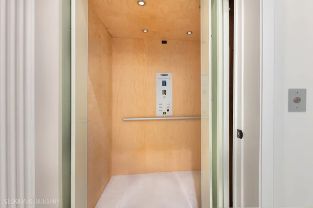 a view of a kitchen with a chandelier