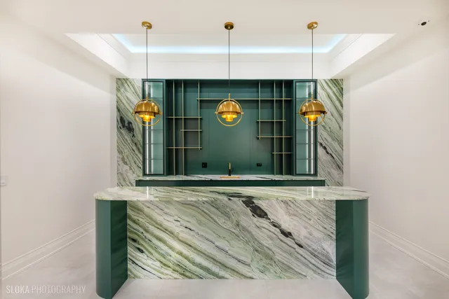 front view of a house with a garden