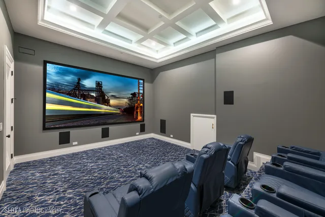 a view of a kitchen with a large window fridge and wooden floor