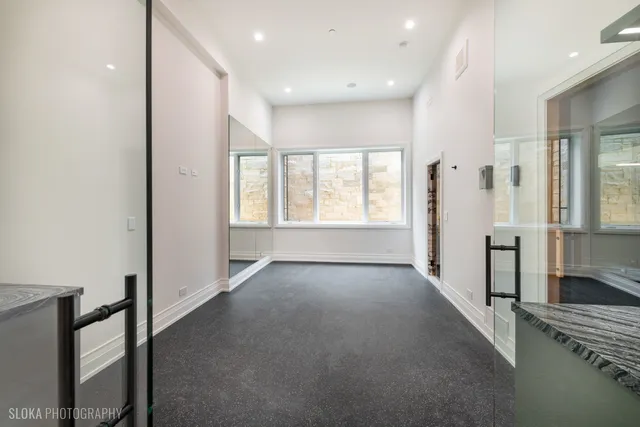 a front view of house with yard and swimming pool