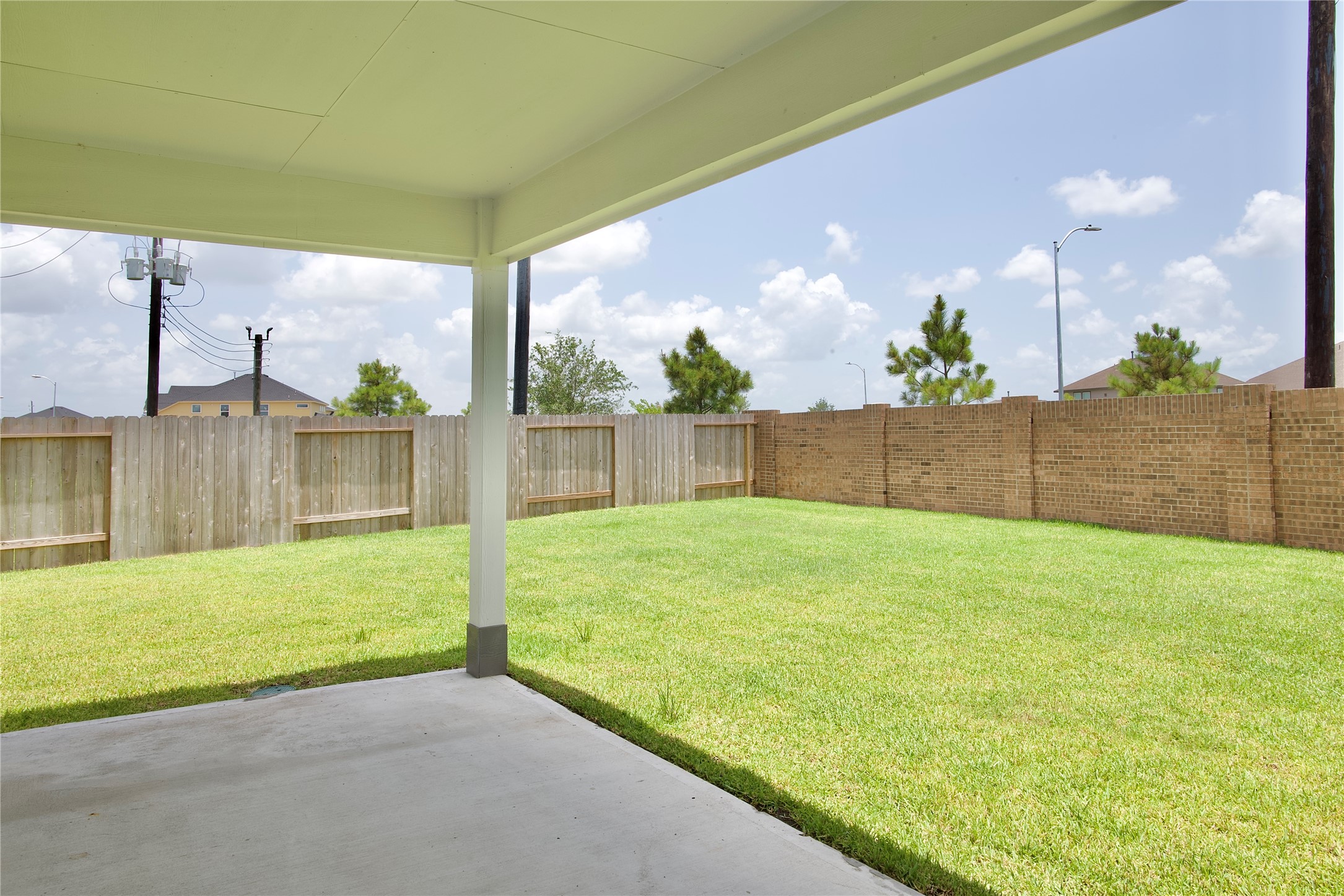 3207 Tilley Drive Rosenberg, TX 77471 - Photo 38 of 43 a view of a backyard with a garden
