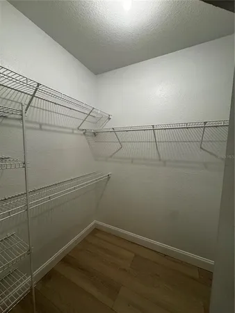 a view of a room with racks on the wall