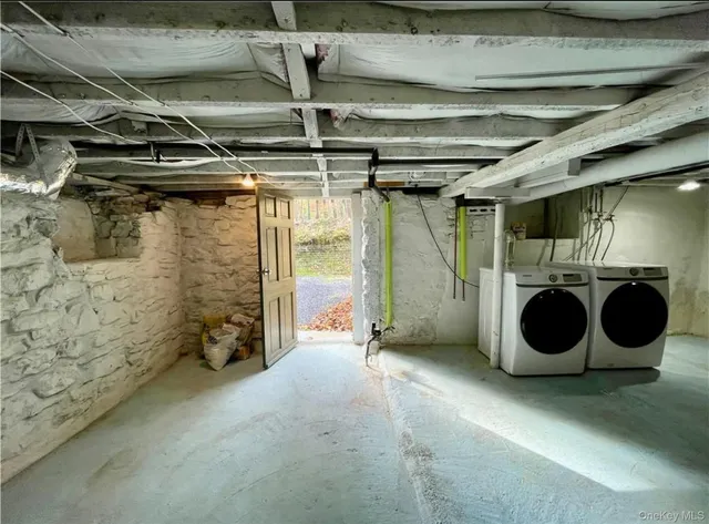 a utility room with dryer and washer