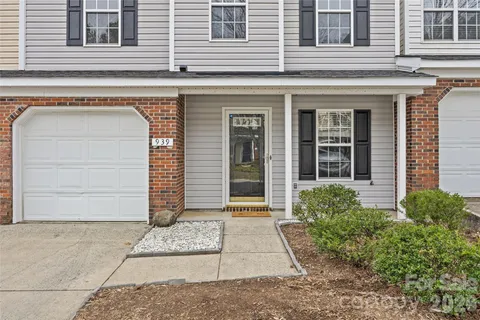 a view of a building with a window and pathway