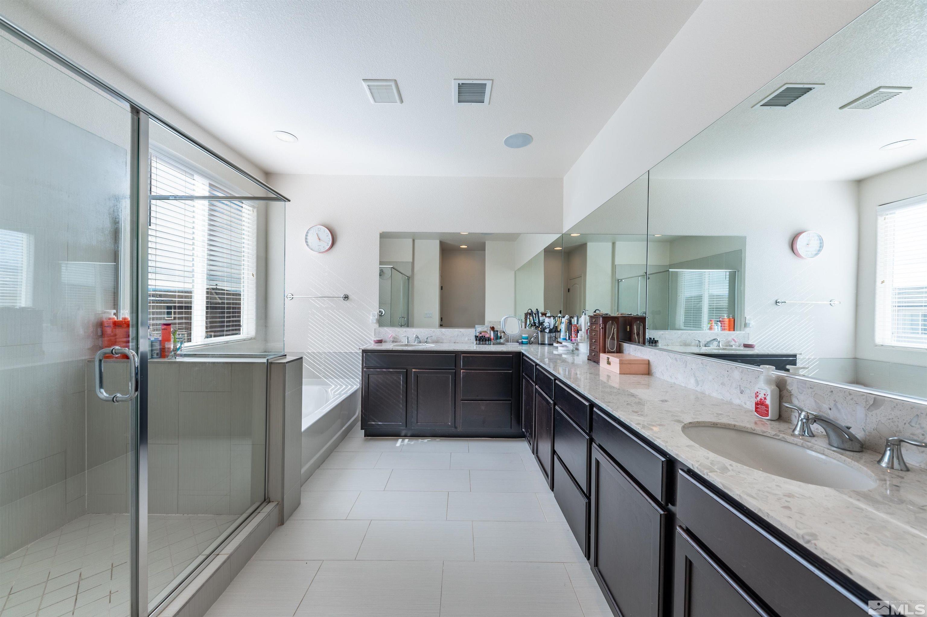 2980 Show Jumper Lane Reno, NV 89521 - Photo 10 of 15 a large white kitchen with a large window
