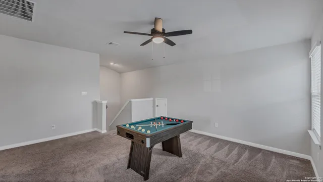 a room with a table and a window