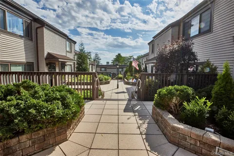a view of a chairs and tables in the patio