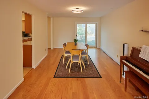 a kitchen with stainless steel appliances wooden cabinets and a sink
