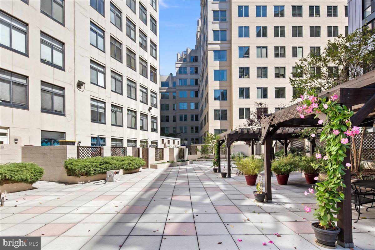 1312 Massachusetts Avenue Northwest, Unit 710 Washington, DC 20005 - Photo 25 of 30 a view of a building with a street