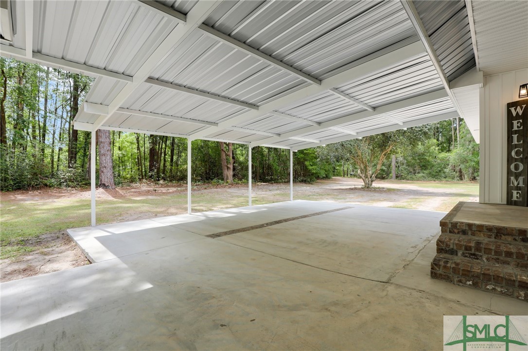 426 Shellie Helmey Road Guyton, GA 31312 - Photo 34 of 41 Carport & Parking