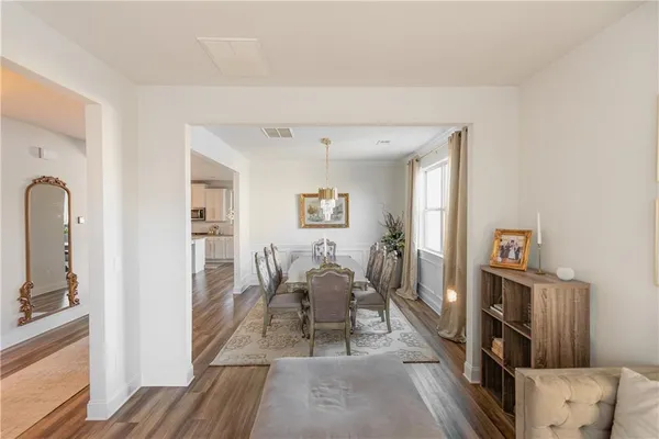 a kitchen with stainless steel appliances granite countertop a sink and cabinets