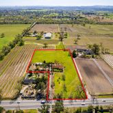 an aerial view of a city with lawn chairs