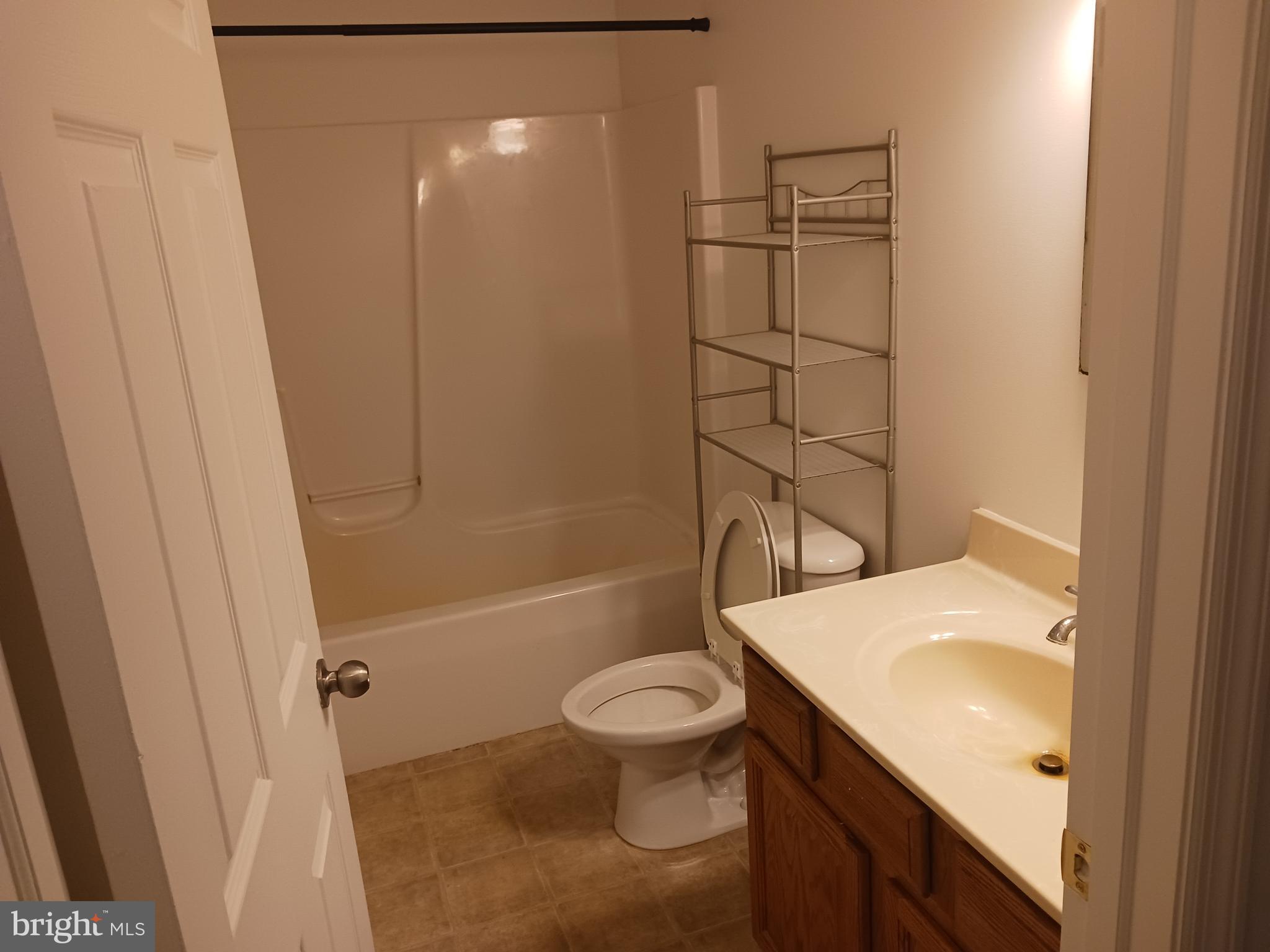 2004 Twymans Mill Road Madison, VA 22727 - Photo 18 of 24 a bathroom with a sink a toilet and shower