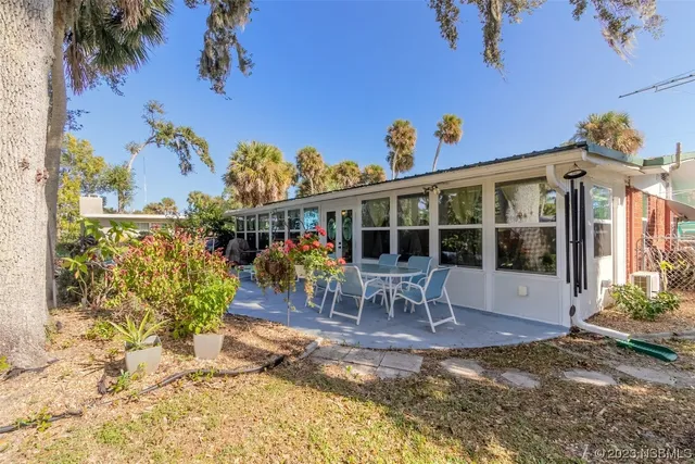 a view of a house with a patio