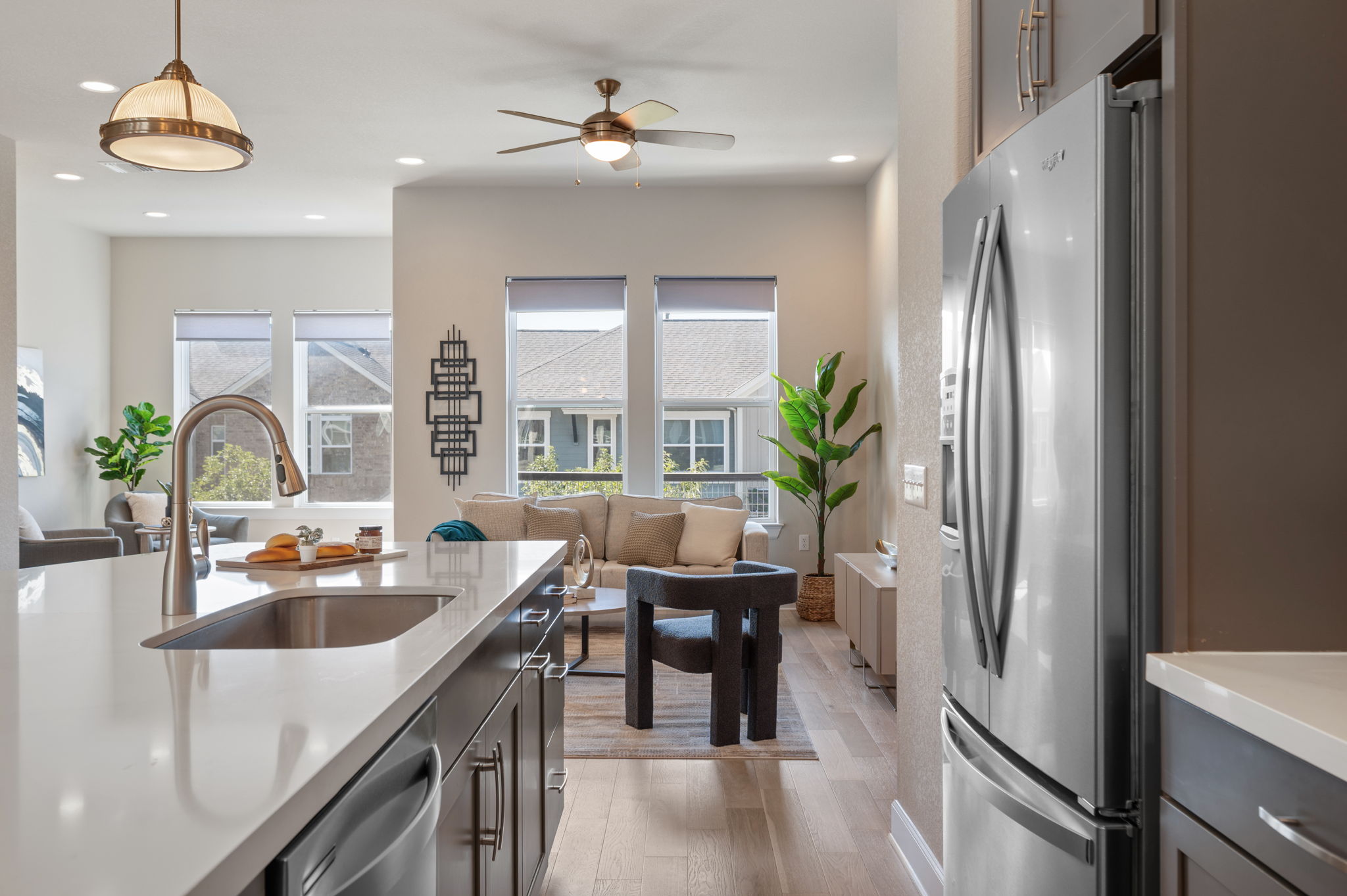 2510 Doc Reeves Street Austin, TX 78723 - Photo 14 of 39 a kitchen with a refrigerator a sink and cabinets