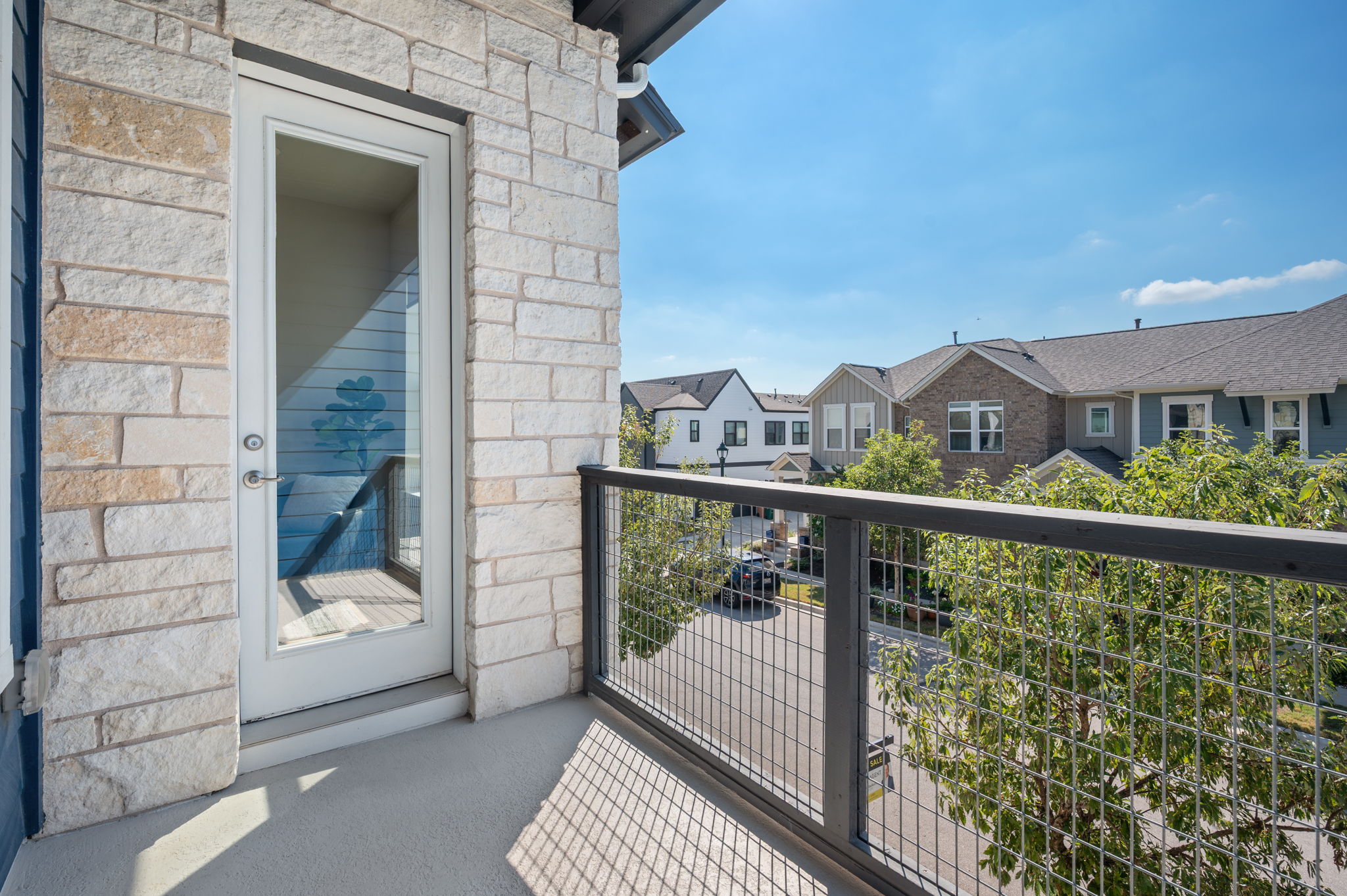 2510 Doc Reeves Street Austin, TX 78723 - Photo 19 of 39 a view of a balcony with a pot