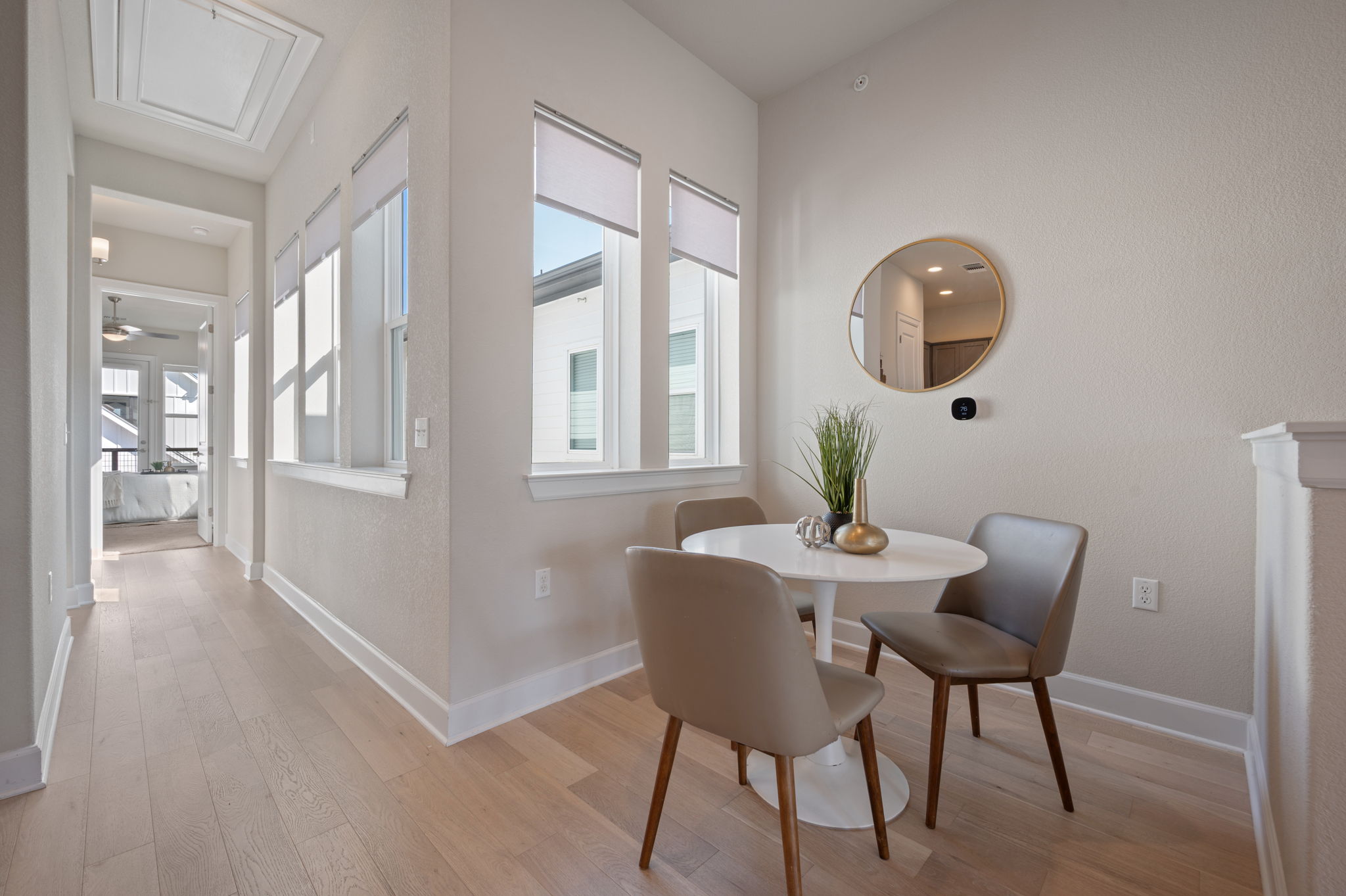 2510 Doc Reeves Street Austin, TX 78723 - Photo 20 of 39 a view of a dining room with furniture and wooden floor