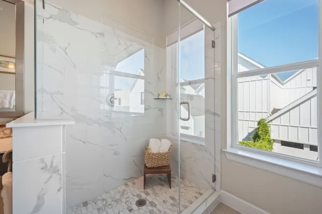 a bathroom with a sink and a window