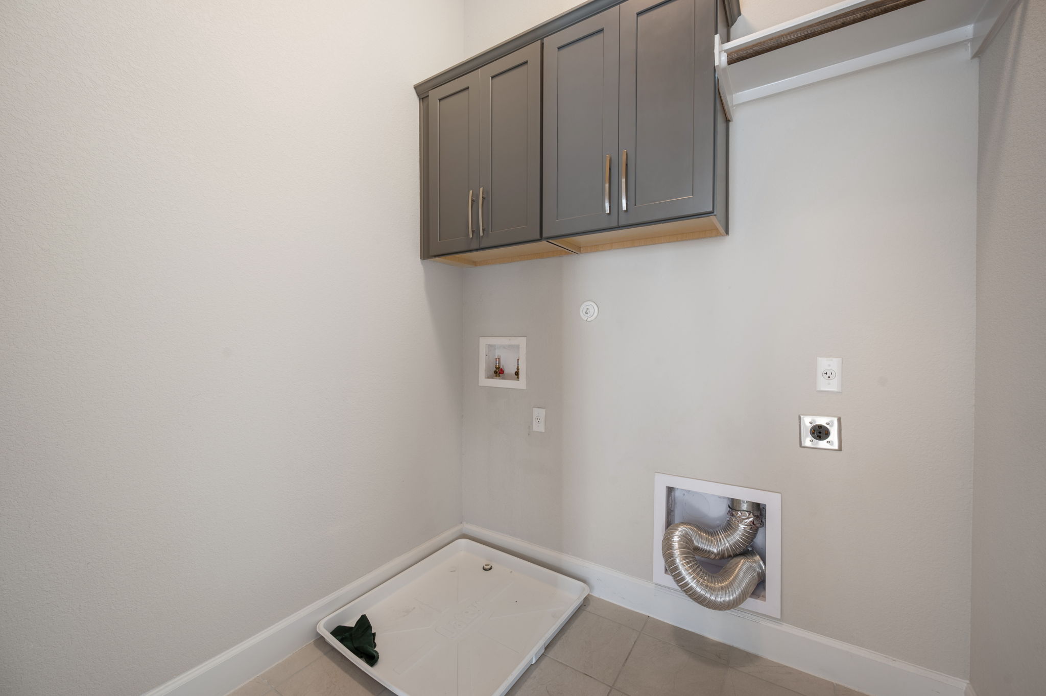 2510 Doc Reeves Street Austin, TX 78723 - Photo 25 of 39 a view of storage and utility room with wooden floor
