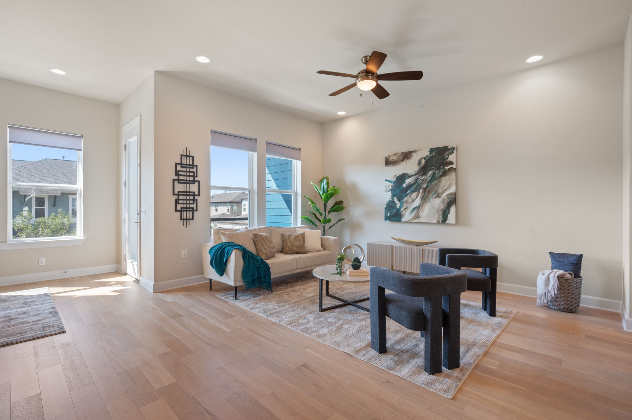 2510 Doc Reeves Street Austin, TX 78723 - Photo 8 of 39 a living room with furniture and a wooden floor